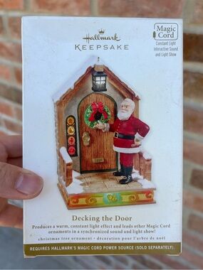 2011 Decking The Door Hallmark Ornament Magic Cord Christmas Tree Ornament NWT